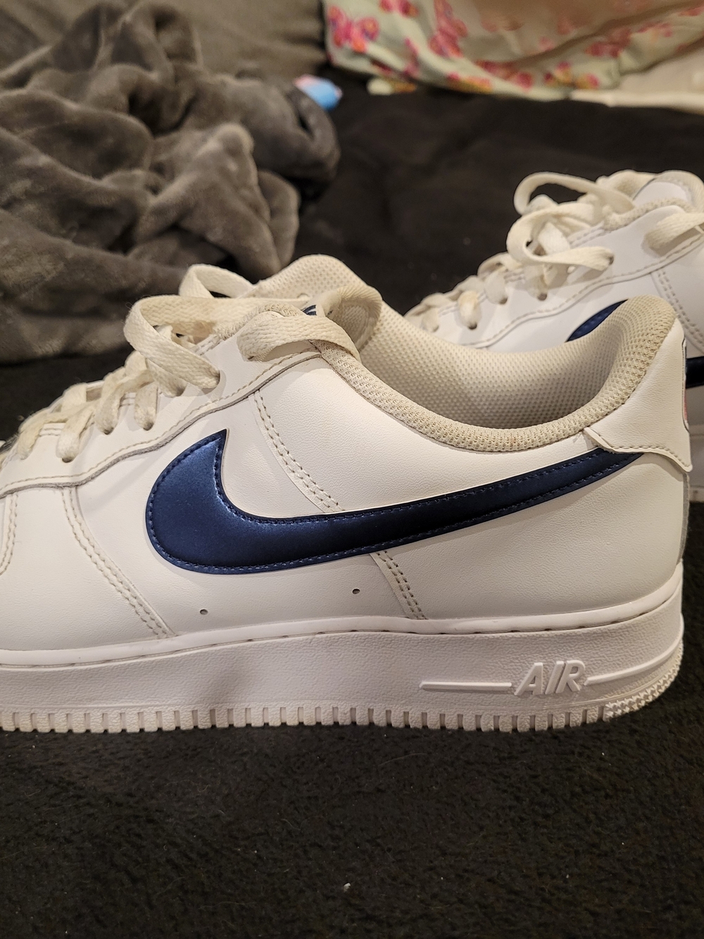 Nike Air Force 1 White Sneakers with Navy Swoosh